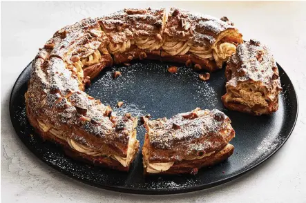  ?? ANDREWS. PHOTOS BY ARMANDO RAFAEL/THE NEW YORK TIMES FOOD STYLED BY SIMON ?? Incomparab­ly delicious, Paris-Brest is an undertakin­g, but one that’s easily broken down into parts that you can do ahead.