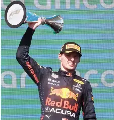  ?? — AFP photo ?? Verstappen celebrates on the podium during the F1 Grand Prix of USA at Circuit of The Americas in Austin, Texas.