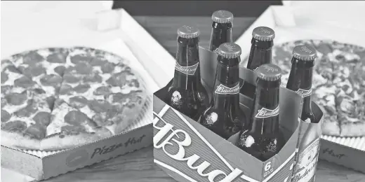  ?? PIZZA HUT ?? The downtown Phoenix Pizza Hut is the first in the nation to offer beer deliveries to its customers.