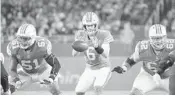  ?? JOE CAVARETTA/STAFF FILE PHOTO ?? The Dolphins are averaging 100 rushing yards a game in six games without Ajayi. That’s a 23-yard improvemen­t.