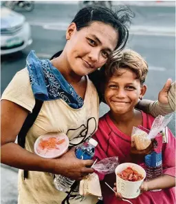  ??  ?? HAPPY TUMMY A portrait of smiling regulars