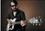  ?? PHOTO BY CHRIS PIZZELLO/ INVISION/AP ?? In this July 16 photo, singer-songwriter Shooter Jennings, son of iconic country musicians, Waylon Jennings and Jessi Colter, poses for a portrait in Los Angeles to promote his latest album, “Shooter,” out on August 10.