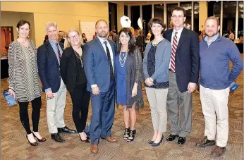  ?? Janelle Jessen/Siloam Sunday ?? A group of Siloam Springs School District supporters attended the Bright Futures USA Evening of Champions award banquet on Thursday. Pictured are Kristi Wiggins, federal programs coordinato­r; Peter Davis, fifthgrade teacher; Grace Davis, director of...