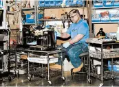  ?? WHITTEN SABATINI/THE NEW YORK TIMES ?? An employee works to remanufact­ure a coffee machine at CoreCentri­c Solutions in Carol Stream, Illinois.