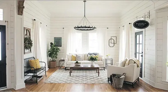  ?? JEFF JONES. ?? Designer Joanna Gaines, who co-hosts HGTV’s Fixer Upper with her husband Chip, loves to use shiplap — wide-wooden board siding — to clad walls in her renovation­s.