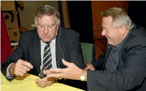  ??  ?? Well known throughout the country, ‘‘Coach’’ was comfortabl­e rubbing shoulders with other New Zealand sports ‘‘royalty’’ such as Colin Meads at a fundraisin­g event in Opunake in 2009.