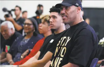  ?? Jae C. Hong / Associated Press ?? LaVar Ball (right) questioned the extent of President Trump’s involvemen­t in securing the release of his son, basketball player LiAngelo Ball, from the custody of Chinese authoritie­s.