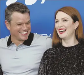  ?? Ap photos ?? ‘WHITE PRIVILEGE’: Actors Matt Damon and Julianne Moore, who star in George Clooney-produced and -directed film ‘Suburbicon,’ pose for a photo at the Venice Film Festival yesterday.