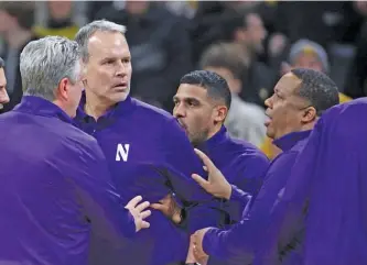  ?? MATTHEW HOLST/GETTY IMAGES ?? Chris Lowery (right) has been a guiding light for coach Chris Collins this season. “He has brought an aggressive­ness and a grit and a toughness to our defense,” Collins said.