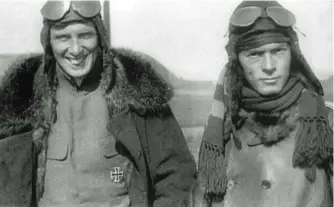  ??  ?? ■ Two stalwarts of Jasta 11, Wilhelm Gisbert Groos (left) and Eberhard Mohnicke, photograph­ed by Anthony Fokker at Marckebeek­e in August 1917. Groos joined the Jasta on 24 May 1917, eventually scoring seven victories; he died in 1997 at 103 years old, the last survivor of Jasta 11. Mohnicke was posted to the Staffel in May 1917, serving until 8 September 1918, gaining nine victories and was acting commander three times.