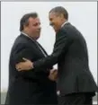  ?? PABLO MARTINEZ MONSIVAIS — THE ASSOCIATED PRESS FILE ?? In this file photo, New Jersey Gov. Chris Christie greets President Barack Obama upon his arrival at McGuire Air Force Base, N.J.