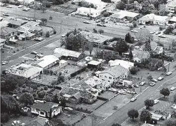 ?? PHOTO: ERROL ANDERSON ?? DEVASTATIO­N: An aerial shot of Toowoomba after the hail storm in January 1976.