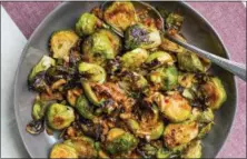  ?? SARAH CROWDER VIA AP ?? This April 2017 photo shows spicy Brussels sprouts. This dish is from a recipe by Katie Workman.