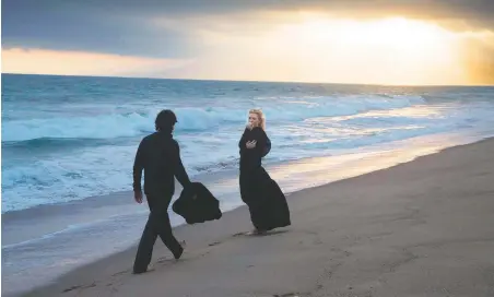  ??  ?? It’s in the cards: Christian Bale and Cate Blanchett in Knight of Cups, at Regal DeVargas