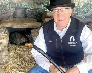  ?? Photo by Larry McGuire/The Punxsutawn­ey Spirit ?? Tom Dunkel, president of the Punxsutawn­ey Groundhog Club, announces the birth of two baby groundhogs to Punxsutawn­ey Phil and Phyllis.