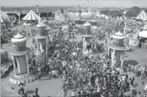  ??  ?? Around 20,000 children taste of the ‘happiest children’s party ever.’