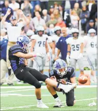  ?? Bob Luckey Jr. / Hearst Connecticu­t Media ?? As Tyler Herget holds, Darien’s Will Kirby scores the first points of the game during the second quarter.