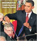  ??  ?? DECORATED Hawking gets Obama medal