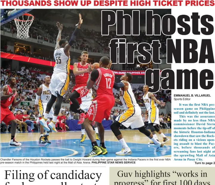  ?? PHILIPPINE STAR NEWS SERVICE ?? Chandler Parsons of the Houston Rockets passes the ball to Dwight Howard during their game against the Indiana Pacers in the first ever NBA pre-season match in the Philippine­s held last night at the Mall of Asia Arena.
