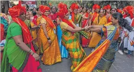  ?? Picture: AP Photo/Rafiq Maqbool ?? Hindu women dancing at the opening of a grand temple for the Lord Ram, in India’s northern Ayodhya city during a procession in Mumbai, India.
