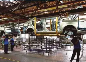  ?? BLOOMBERG PIC ?? Prime Minister Tun Dr Mahathir Mohamad says Proton is no longer Malaysia’s national car as a substantia­l stake in the company is now owned by China’s Zhejiang Geely Holding Group.