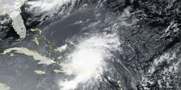  ?? NATIONAL WEATHER SERVICE ?? A satellite image shows Tropical Storm Isaias nearing Cuba and the Florida coast.