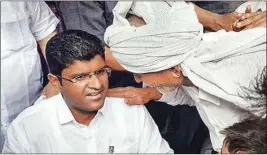  ?? PTI ?? JJP leader Dushyant Chautala interacts with locals in Sirsa district of Haryana, Monday