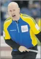  ?? Michael Burns photo ?? Alberta skip Kevin Koe of Calgary calls for his sweepers on Wednesday.