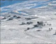  ?? AFP ?? PLA soldiers and tanks seen during military disengagem­ent along the LAC in Ladakh, in an undated photograph released by the Indian Army on February 16, 2021.