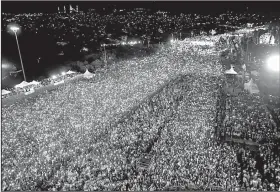  ?? AP ?? Thousands of people gather Saturday in Istanbul to celebrate the failure of last year’s coup attempt.