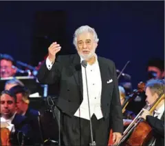  ?? ATTILA KISBENEDEK/AFP ?? Spanish tenor Placido Domingo performs during his concert in the newly inaugurate­d sports and culture centre ‘St Gellert Forum’ in Szeged, southern Hungary in August.