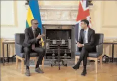  ?? -AFP ?? KIGALI, RWANDA
Rwandan President Paul Kagame, left, and British Prime Minister Rishi Sunak.