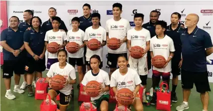  ?? (SUPPLIED PHOTO) ?? THE Mindanao-based dribblers strike a pose with the National Training Camp coaches after hurdling the test in Butuan camp. They will represent the Jr. NBA NTC camp in Manila.