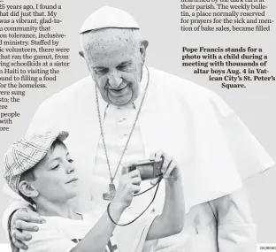  ?? GIORGIO ONORATI, EUROPEAN PRESSPHOTO AGENCY ?? Pope Francis stands for a photo with a child during a meeting with thousands of altar boys Aug. 4 in Vatican City’s St. Peter’s
Square.