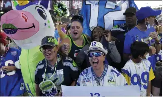  ?? JOHN LOCHER — THE ASSOCIATED PRESS ?? Seattle Seahawks fans cheer during the third day of the NFL draft in Las Vegas.