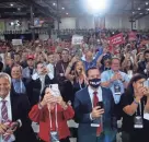  ?? BRENDAN SMIALOWSKI/ AFP VIA GETTY IMAGES ?? People cheer as Trump arrives for an indoor rally.