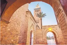  ?? HENRYK SADURA GETTY IMAGES ?? Koutoubia Mosque, one of the most recognizab­le landmarks in Marrakech, dubbed the Red City for its sandstone buildings.