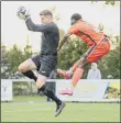  ??  ?? KEEPER’S BALL US Portsmouth’s Tom Price gathers safely from AFC Portcheste­r’s Toby Adekunle