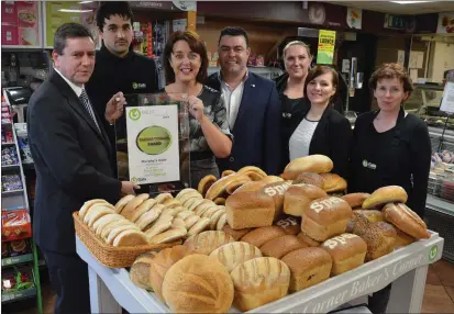  ??  ?? Bill Massey of Gala with proprietor­s Irene and Jeremy Murphy and their team at Murphy’s Gala in Drumcummer.