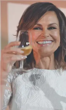  ?? Picture: AAP ?? Lisa Wilkinson at the Moet and Chandon Guinness Book of Records tasting attempt in Sydney yesterday.