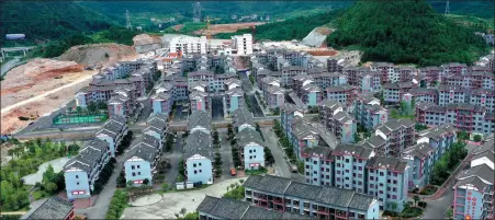  ?? YANG YING / XINHUA ?? An aerial view of a resettleme­nt community for relocated impoverish­ed families in Tongren, Guizhou province.