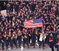 ??  ?? The US team parades at the opening ceremony. Photo: Reuters