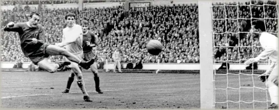  ?? POPPERFOTO/GETTY IMAGES ?? Saint’s Day: Ian St John acrobatica­lly heads home at the death to clinch Liverpool’s first ever FA Cup