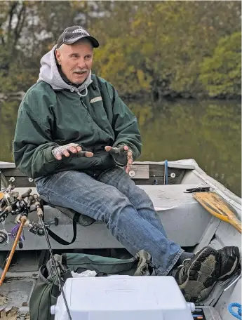  ?? DALE BOWMAN/FOR THE SUN-TIMES ?? Ron Urick relaxed and told stories of teaching science after a day of fishing on one of the lakes where he would take the top students fishing during his 33 years at Stevenson High School.