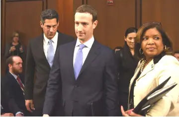  ??  ?? Zuckerberg arrives for a Senate committee hearing in Washington, D.C.