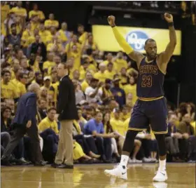  ?? MICHAEL CONROY — THE ASSOCIATED PRESS ?? Cavaliers forward LeBron James celebrates a basket in the second half of Game 3 of a first-round playoff game on April 20 in Indianapol­is. The Cavaliers came back from a 25-point deficit and defeated the Pacers .119-114.