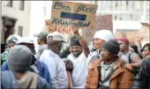  ??  ?? Residents from Scottsdene in Kraaifonte­in march to the Cape Town High Court to protest for houses.