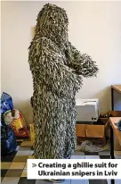  ?? ?? > Creating a ghillie suit for Ukrainian snipers in Lviv