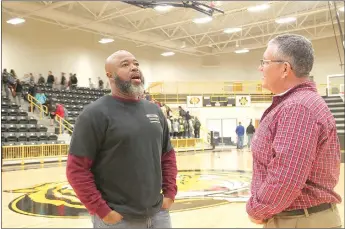  ?? LYNN KUTTER ENTERPRISE-LEADER ?? Fred Lynch, left, with Rachel’s Challenge, visits with Ron Bond, principal of Prairie Grove High School. Lynch led a training on being kind and compassion­ate with Prairie Grove students earlier this month.