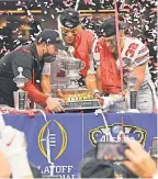  ?? KEN RUINARD/ USA TODAY SPORTS ?? Ohio State’s Ryan Day, Justin Fields and Tuf Borland ( 32) celebrate the Sugar Bowl Classic victory.